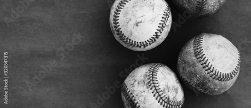 Plakat Old rough grunge texture baseballs on vintage background in black and white with room for text.