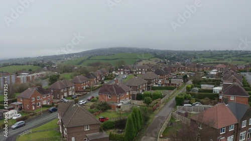 Aerial view, footage of a council housing estate in Kidsgrove Stoke on Trent, flats, homes for the ever growing population, immigration and poorer areas of the west midlands, cheap, affordable housing photo