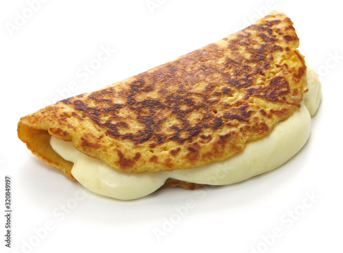 cachapa, venezuelan corn pancake with handmade cheese photo