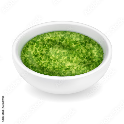 Realistic pesto sauce in a bowl