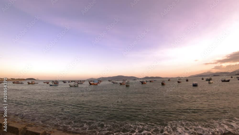Vietnamese fishing boats at sunset Vietnamese fishing boats at sunset