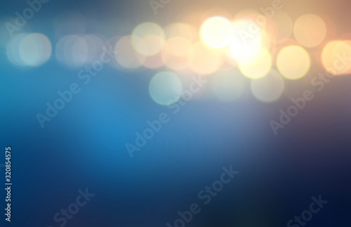 Golden lights on dark blue blurred background. Abstract illustration. Mystery bokeh pattern. 