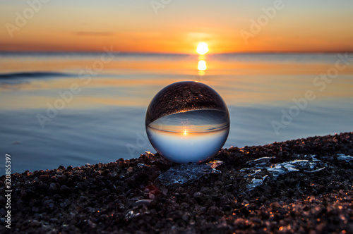glass ball on the beach