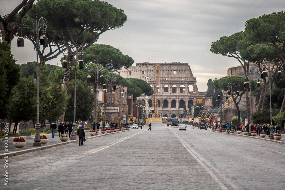 View of Via dei Fori Imperiali and Colosseum. Rome, Italy.