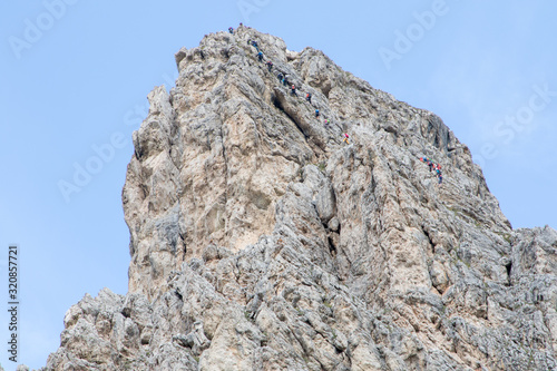 August 28, 2019: roped climbers are about to climb Mount CIR, Italian Dolomites