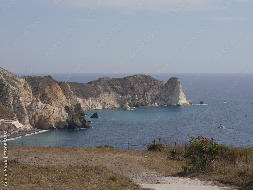 Views of the caldera, mountains, the Mediterranean Sea, and the city of Fira from the Akrotiri Lighthouse. Views of the caldera, mountains, the Mediterranean Sea, and the city of Fira from the Akrotiri Lighthouse.