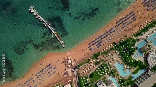 Vrissiana Beach protaras cyprus, sea drone shooting with clear turquoise Mediterranean water photo