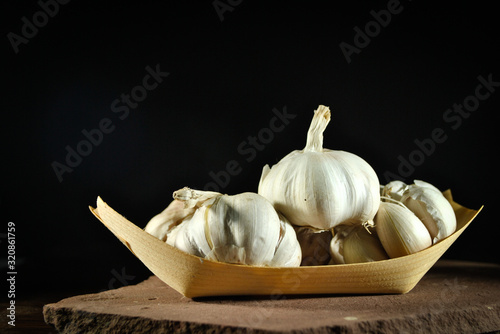 garlic on a black background