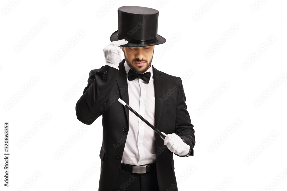 Magician with a magic wand looking down