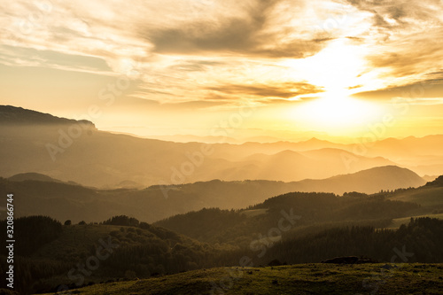 sunset over the hills on the basque country, spain