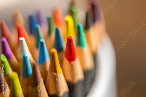 Close up of color pencils on light background 