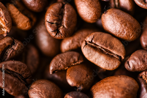 Coffee roasted beans background. Copy space for text.
