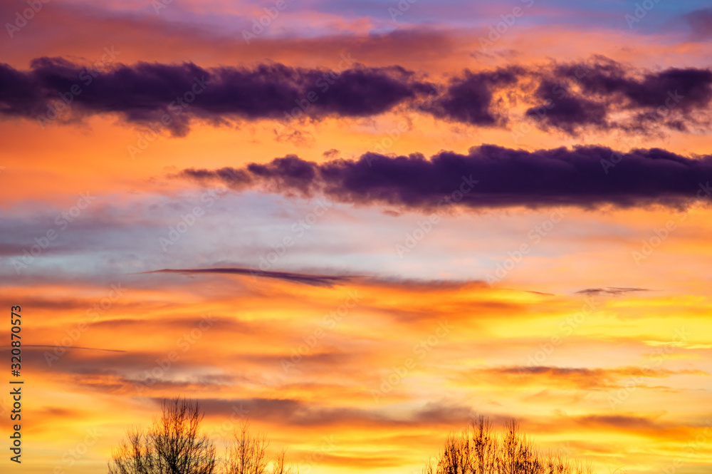 Red and yellow clouds in the sunset sky Red and yellow clouds in the sunset sky