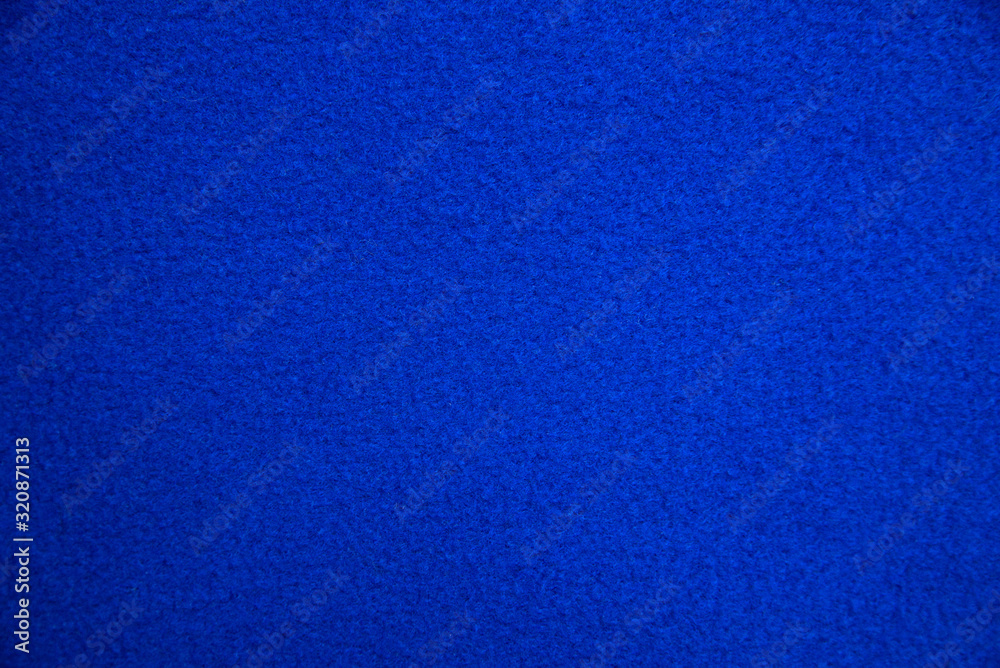 texture of blue fleece plaid fabric. classic blue fabric color