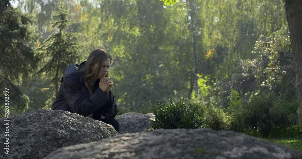Prayer In City Park. Young Man Praying In the Morning. Christian Missionary, Monk, Priest