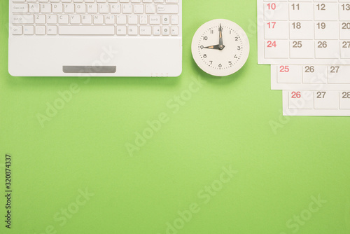 Calendar with dates, clock and keyboard 