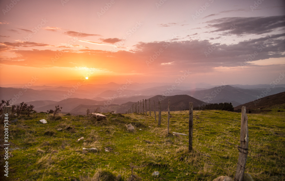 sunset over the hills in basque country, spain