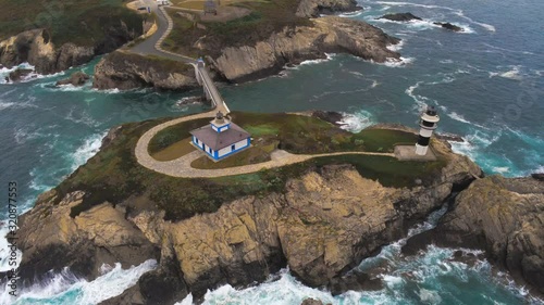 Beautiful ligthouses of Illa Pancha in Ribadeo, Lugo, Galicia ,Spain. Drone Footage photo