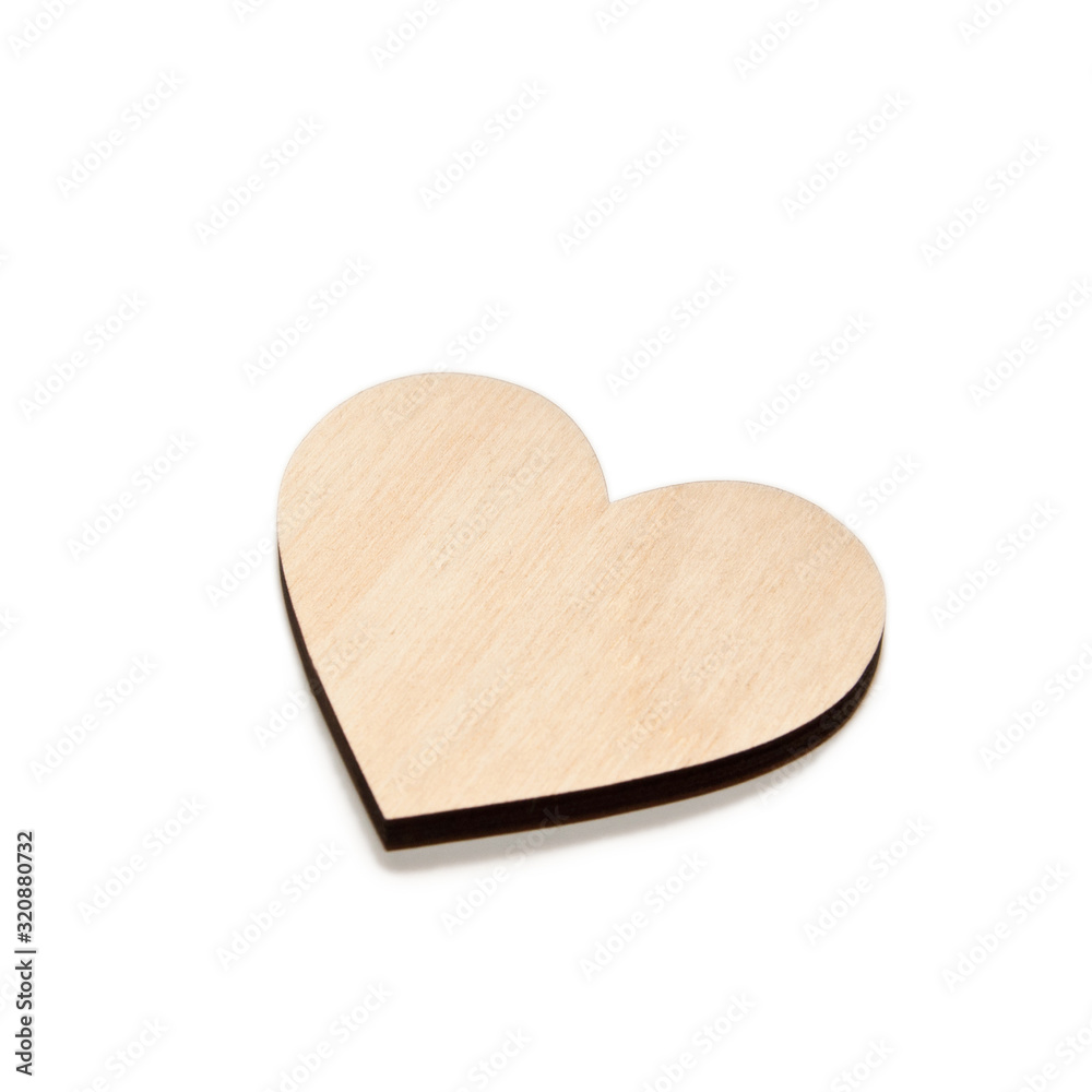 Wooden heart on white background