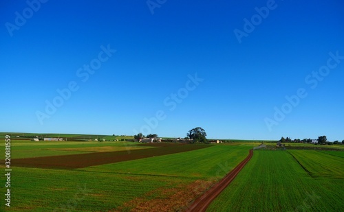 Bright landscape of Morocco, breathtaking curves of mountains, stunning combination of hills & farm land,inadvertent distribution of houses & huts, raw impression of pure nature.