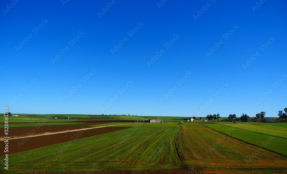 Bright landscape of Morocco, breathtaking curves of mountains, stunning combination of hills & farm land,inadvertent distribution of houses & huts, raw impression of pure nature. Bright landscape of Morocco, breathtaking curves of mountains, stunning combination of hills & farm land,inadvertent distribution of houses & huts, raw impression of pure nature.
