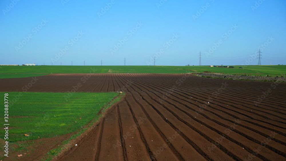 Bright landscape of Morocco, breathtaking curves of mountains, stunning combination of hills & farm land,inadvertent distribution of houses & huts, raw impression of pure nature. Bright landscape of Morocco, breathtaking curves of mountains, stunning combination of hills & farm land,inadvertent distribution of houses & huts, raw impression of pure nature.