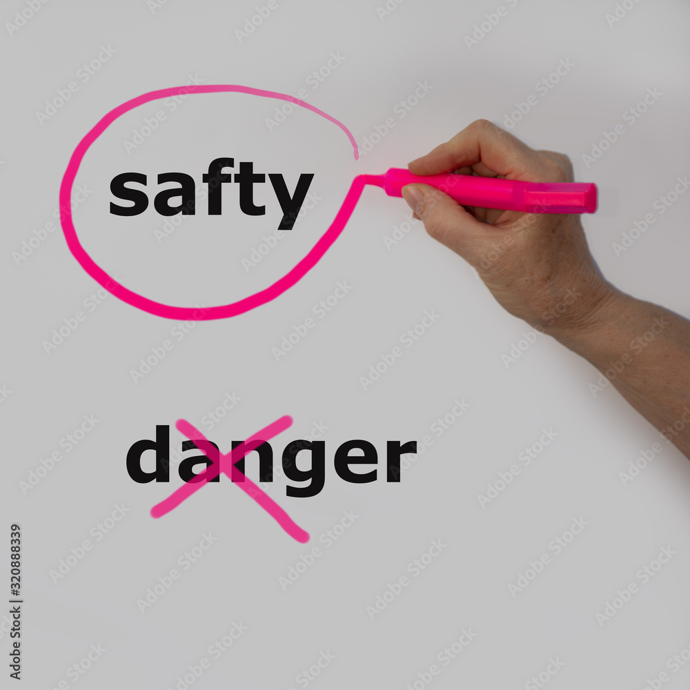 The word juice is circled with a pink pencil by a hand with a bubble, the word danger is crossed