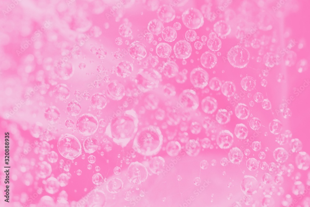 Pink gradient abstract background with water drops pattern