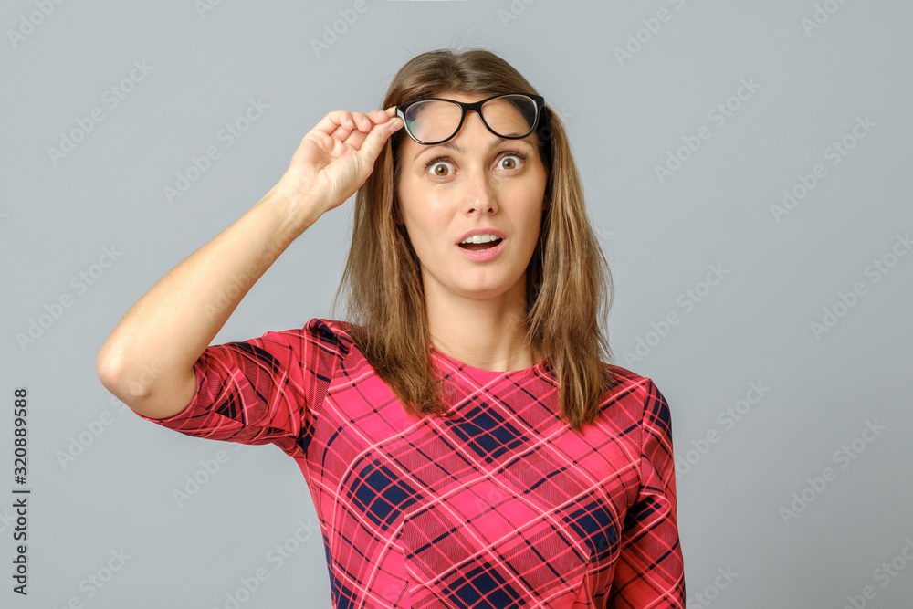 Impressed speechless pretty caucasian female woman Impressed speechless pretty caucasian female woman