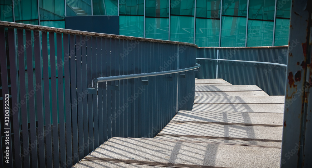 Fototapeta premium modern public staircase viewed from above descending