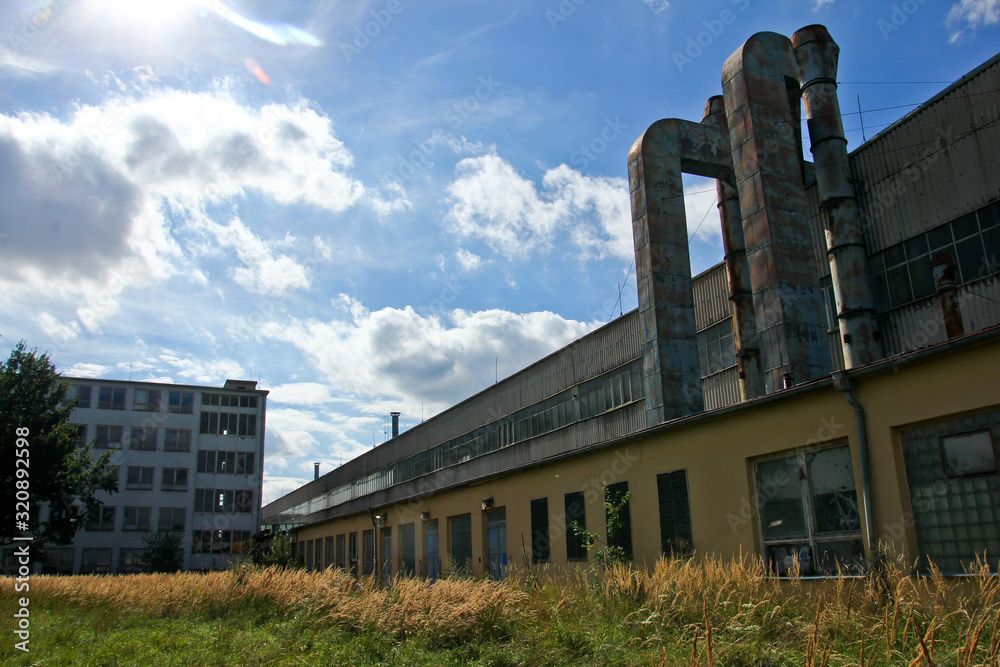 An abandoned factory near a city is waiting for the explorers. 