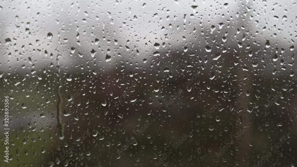 Raindrops on a window Closeup 4k Apple ProRes422 Raindrops on a window Closeup 4k Apple ProRes422