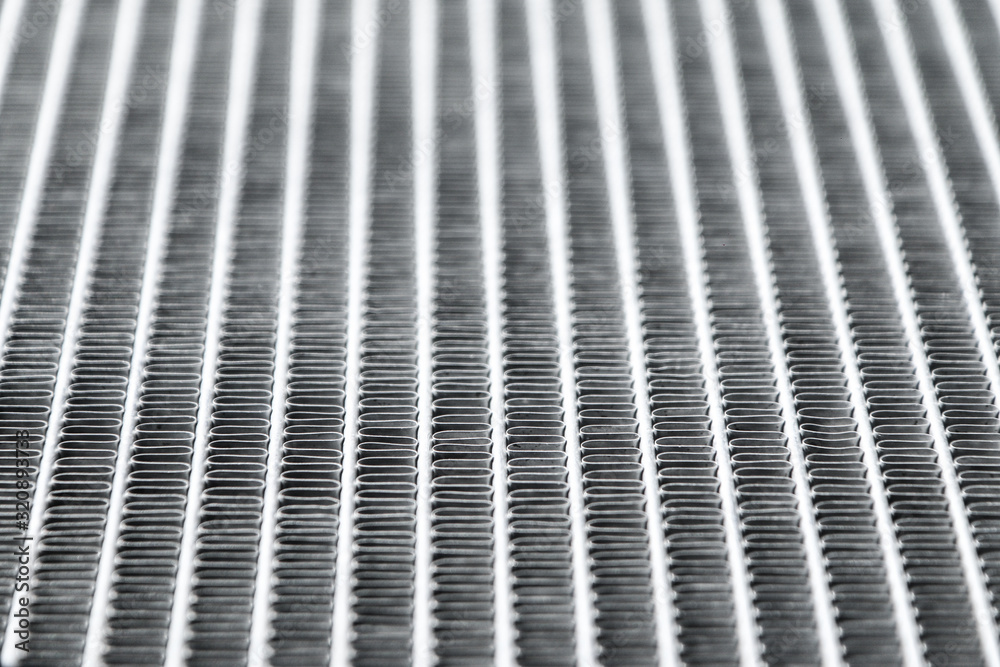 A detail of a ribbing of the car´s aluminium sport radiator. 