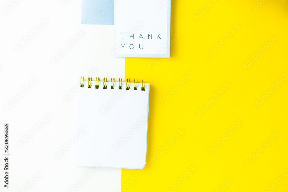 background with office objects in blue and yellow tone with thanks