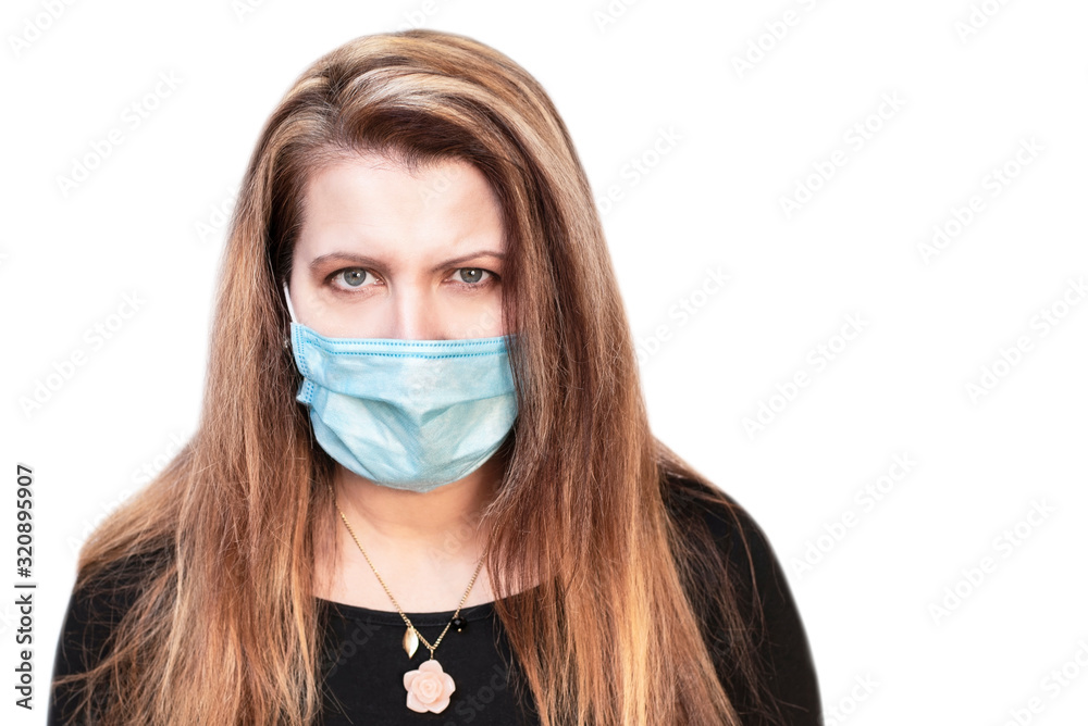 Beautiful but sad woman with medical mask on face on a white background. The woman is sad because she is afraid of modern viruses that bring terrible diseases Beautiful but sad woman with medical mask on face on a white background. The woman is sad because she is afraid of modern viruses that bring terrible diseases