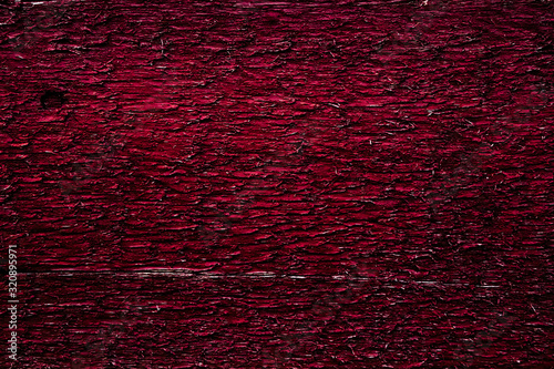 Close-up bright old red wood texture.