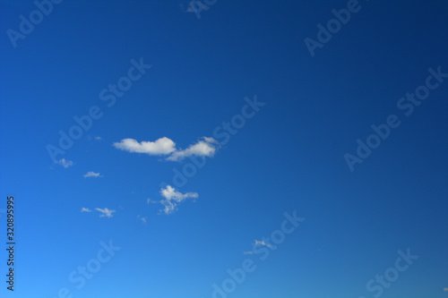 clouds in the sky,sky,blue,nature,fluffy,clear,cloudscape,space,white