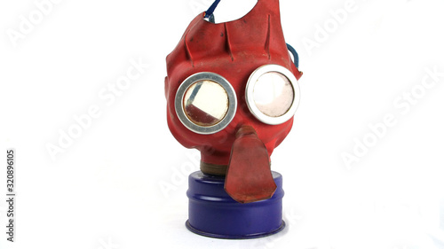 British WW2 Child’s 'Mickey Mouse’ Gas Mask and it's box. These were issued to all UK toddlers, the bright colours were designed to help turn using the mask into a game to keep the child calm 