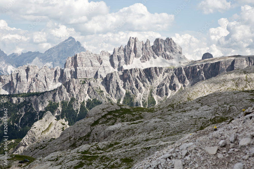Hiking Dolomites mountains of Passo Giau. Peaks in South Tyrol in the Alps of Europe. Sharp rocks