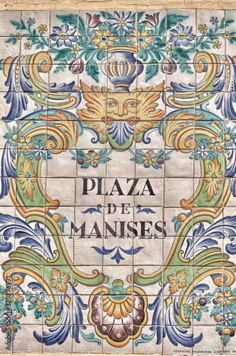 Ceramic tiles street sign of the Manises square in Valencia  Spain