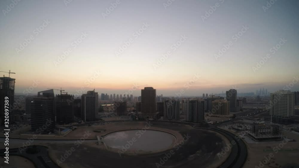 elevated timelapse sunset desert city skyscraper elevated timelapse sunset desert city skyscraper