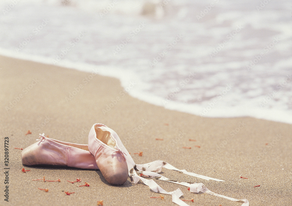 ballet shoes on beach