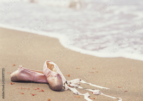 ballet shoes on beach