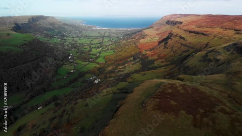 Glenariff is a valley of County Antrim, Northern Ireland. This glacially carved glen has a mouth on the North Channel of the Irish Sea at the town of Waterfoot. photo