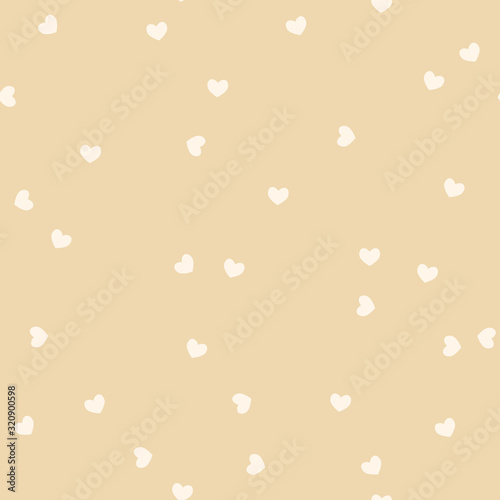 Vector seamless pattern with hearts in chaotic manner. Cute design for fabric, wrapping, wallpaper for Valentine's Day