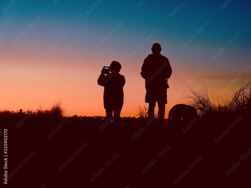 Photographie, Coucher de soleil, Couple, Touristes Photographie, Coucher de soleil, Couple, Touristes