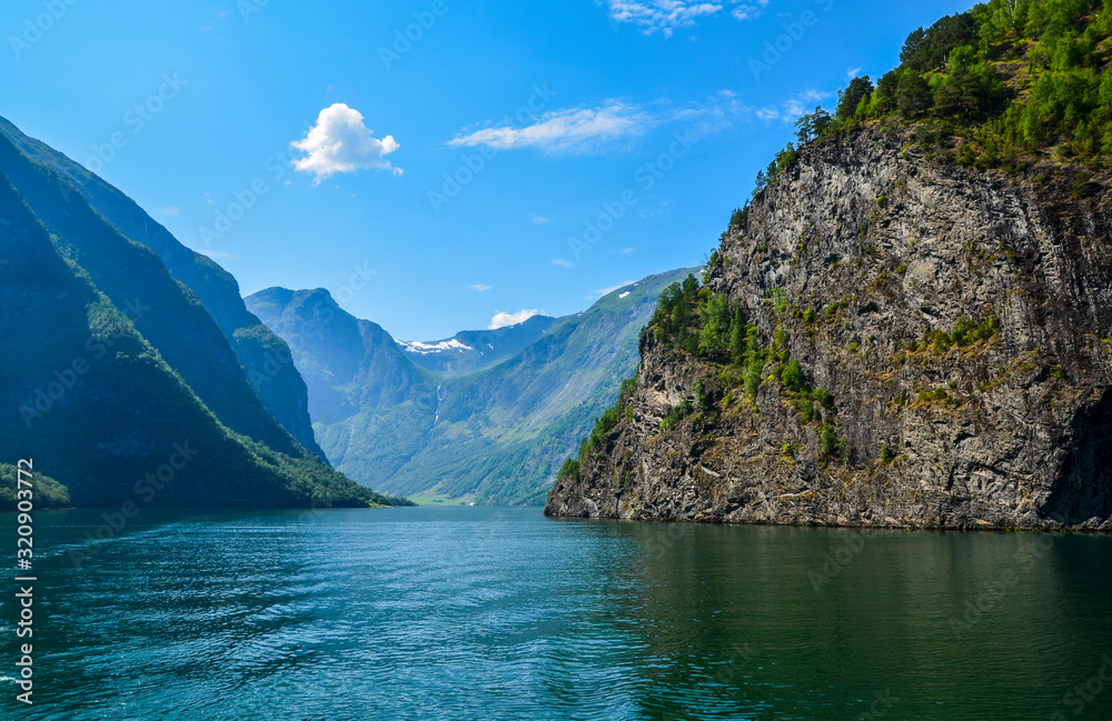 Travel by cruise into the heart of the amazing fjord Sognefjord, Scandinavia, Norway