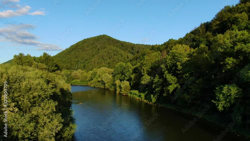 The Ljubljanica River in Podgrad Slovenia before merging with the Sava river ahead, Aerial flyover drone view The Ljubljanica River in Podgrad Slovenia before merging with the Sava river ahead, Aerial flyover drone view
