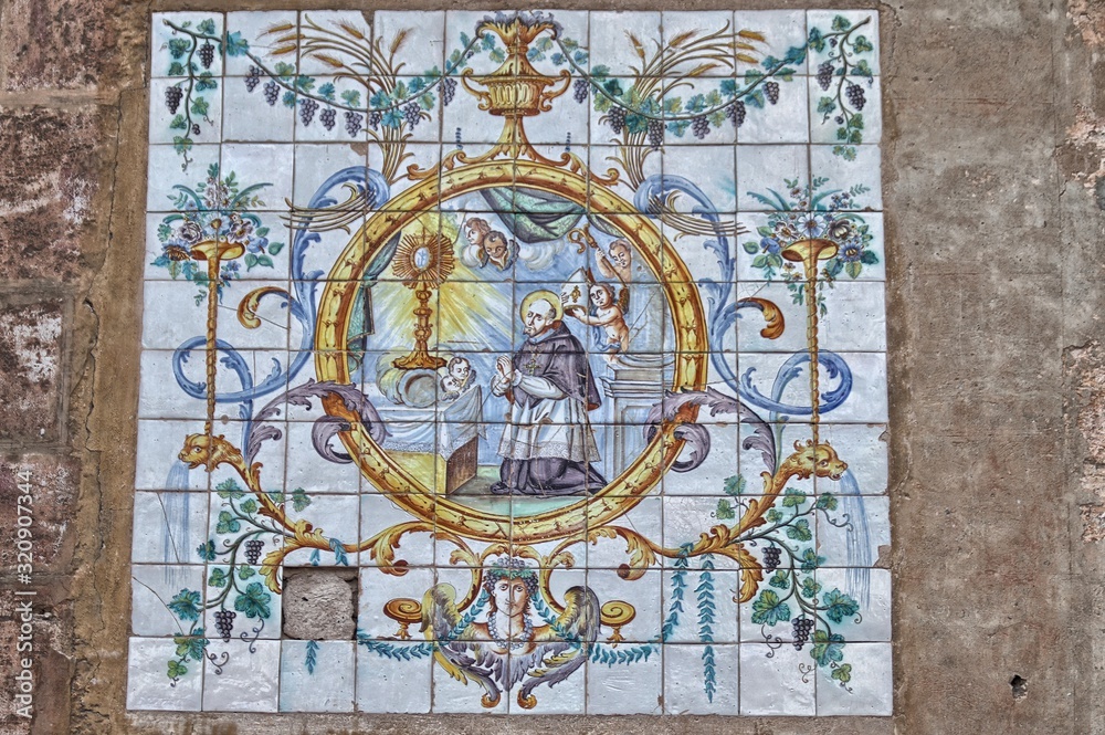 Ceramic tiles street sign of the Patriarca square in Valencia, Spain
