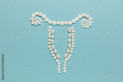 Health and treatment of female womb. Uterus made of pills.